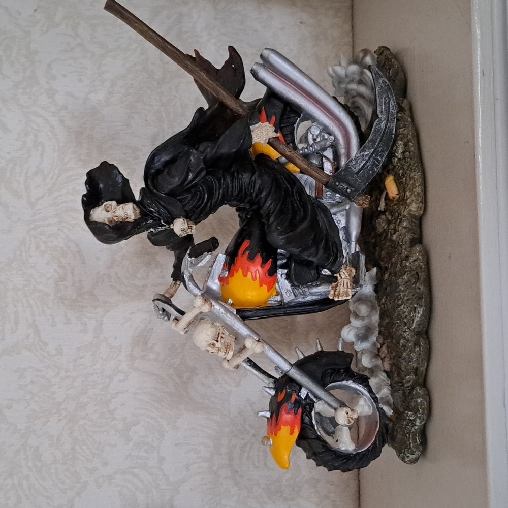 Grim rider figure